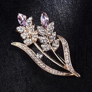 Elegant rose gold wheat brooch with purple marquise gems and sparkling white crystals