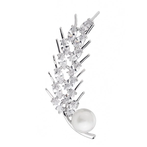 Silver wheat brooch with sparkling marquise zircons and a round white pearl on white background