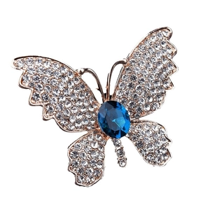 Eleganter Schmetterlings-Anstecknadel mit blauem Edelstein und weißen Strasssteinen in Gold