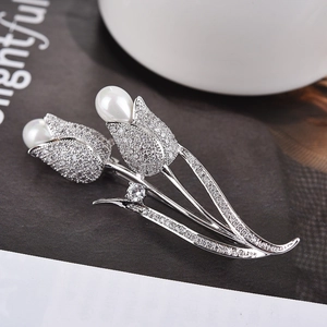 Elegant silver tulip flower brooch with white pearls and micro-pave cubic zirconia crystals