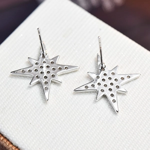 Macro view of S925 sterling silver star stud earring showing precise craftsmanship