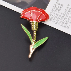 Elegant red enamel carnation brooch with gold alloy leaves and sparkling green rhinestones