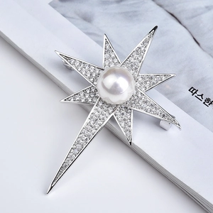 Elegant silver star brooch with sparkling zircon pave and large white pearl center