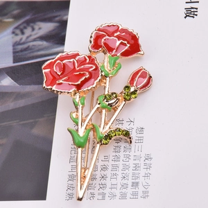 Elegant red carnation flower brooch with gold plating and green crystals for women