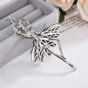 Elegant silver dancing ballet girl brooch with black and yellow crystal accents