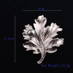 Silver maple leaf brooch with crystal details and grey pearl, size 5.5cm x 4cm