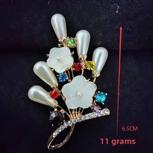 Detailed view of bouquet brooch with pearls and multicolored rhinestones, 6.5cm height