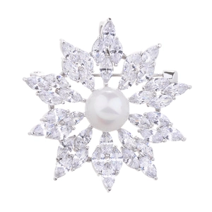Elegant silver snowflake brooch featuring a large center pearl and sparkling marquise zircons