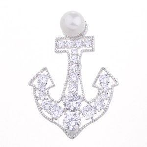 Elegant silver anchor brooch with micro-pave zircons and a white pearl detail