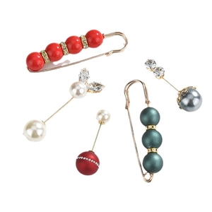 Elegant rhinestone brooch set with pearls and crystals in various colors and styles