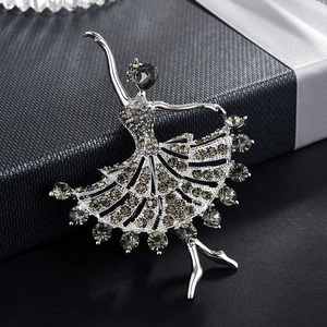 Exquisite silver-tone dancing ballerina brooch with dark grey crystals on textured gift box
