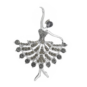 Elegant ballerina brooch with grey crystals and silver metal base on white background