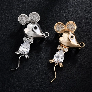 Detail of gold and silver mouse brooches with micro-pave zircons and pear-cut stones