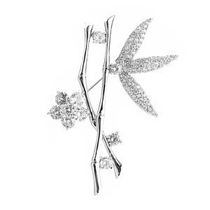 Elegant bamboo shape brooch with silver metal base and shimmering white zircon stones