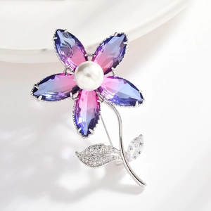 Elegant flower brooch with purple gradient crystal petals and center pearl detail