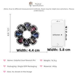 Detailed size comparison of 4.4cm colorful crystal flower brooch next to a smartphone
