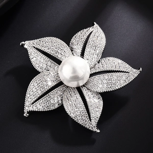 Elegant five-petal floral brooch with zircon pavé petals and central white pearl