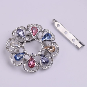 Colorful floral crystal brooch with sparkling rhinestones on a silver metal base