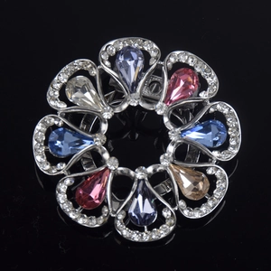 Colorful floral crystal brooch with teardrop rhinestones on a silver metal base