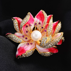 Elegant enamel lotus brooch with pink petals, zircons, and pearl on black silk background