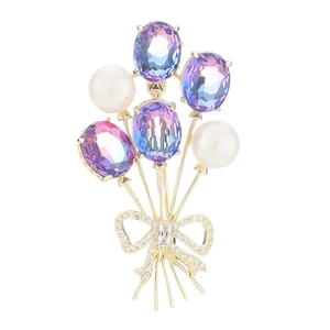 Broche ballon élégante avec cristaux violets dégradés, perles et nœud doré scintillant