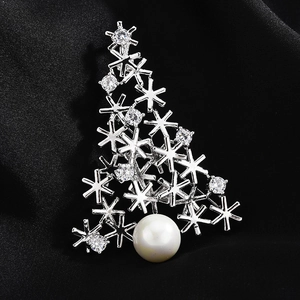 Elegant silver Christmas tree brooch with snowflakes, sparkling zircons and a white pearl