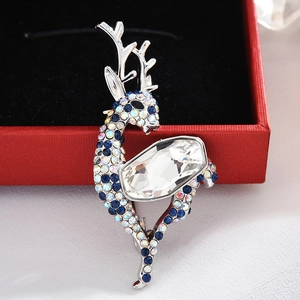 Exquisite silver deer brooch with sparkling blue crystals and large clear center stone