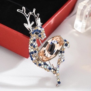 Elegant deer brooch with multicolored crystals and a large champagne gemstone inlay