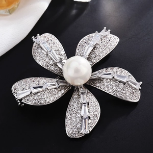 Elegant silver flower brooch featuring a large pearl center and sparkling zircon stones