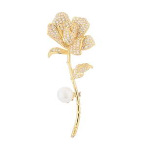 Elegant gold rose flower brooch with micro-pave crystals and a large white pearl detail