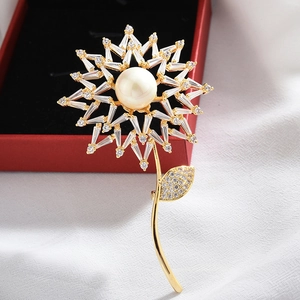 Detailed macro view of gold sunflower brooch with pearls and rectangular zircon petals
