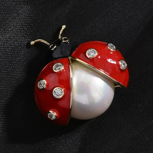 Elegant ladybug pearl brooch with red enamel wings and sparkling crystal rhinestones