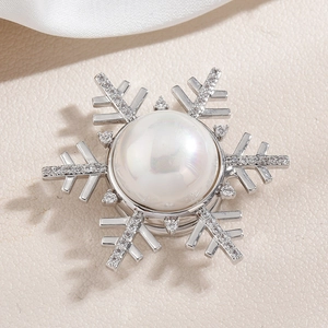 Elegant silver snowflake magnetic brooch with large central pearl and sparkling zircon accents