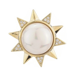 Elegant gold sunburst brooch with white faux pearl and crystals on white background