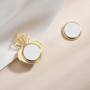 Elegant gold heart crown magnetic brooch pin for clothing on silk background