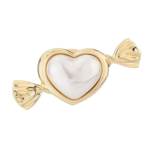 Elegant candy shaped magnetic brooch with gold metal frame and heart pearl center
