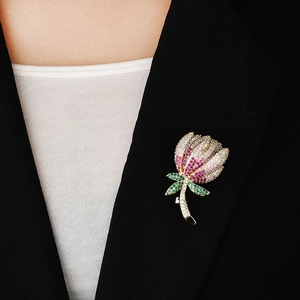 Elegant floral zircon tulip brooch for women pinned on a stylish black suit lapel