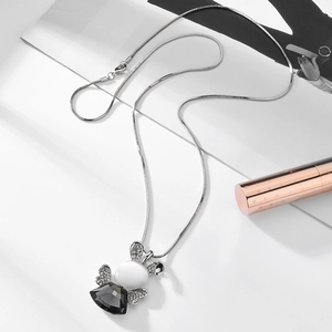 Elegant rabbit pendant necklace with cat eye stone and crystals on a silver chain