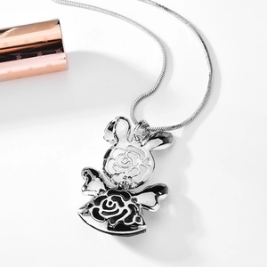Silver rabbit pendant necklace with hollow rose flower pattern on delicate snake chain