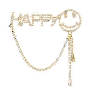 Broche HAPPY dorée avec zircons étincelants, design smiley et pendentifs à franges
