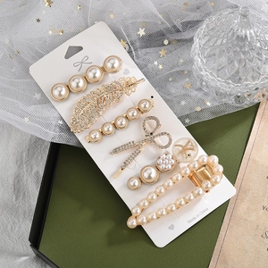 Lot de 6 barrettes dorées avec plumes, nœuds et perles pour un coiffage élégant
