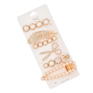 Set de 6 barrettes dorées avec motifs plumes, ciseaux et perles pour femmes