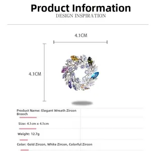 Vue détaillée de l'élégante broche couronne florale avec zircons colorés et dimensions