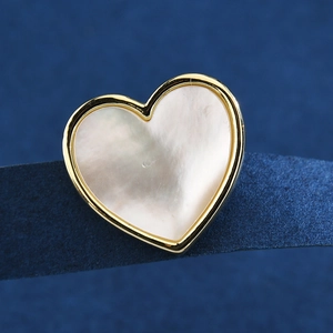 Elegant heart-shaped brooch with white mother of pearl inlay and gold-plated metal frame