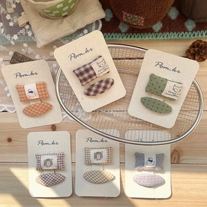 Polka dot fabric hair clips for girls set with cute animal motifs and checkered patterns