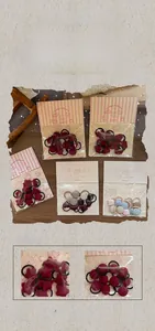 Detail showing colorful fabric elastic hair ties in star and geometric shapes for kids