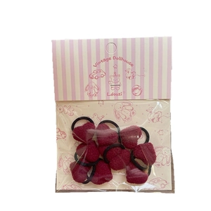 Set of burgundy plush heart hair ties for kids with soft velvet texture and elastic bands