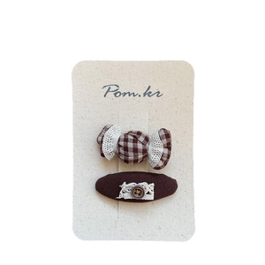 Handmade brown checkered candy and button hair clips for girls set on display card