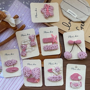 Coffret de barrettes à cheveux roses avec nœuds à paillettes et motifs floraux