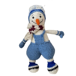 Handmade wool snowman doll with blue hat, striped scarf and overalls on white background